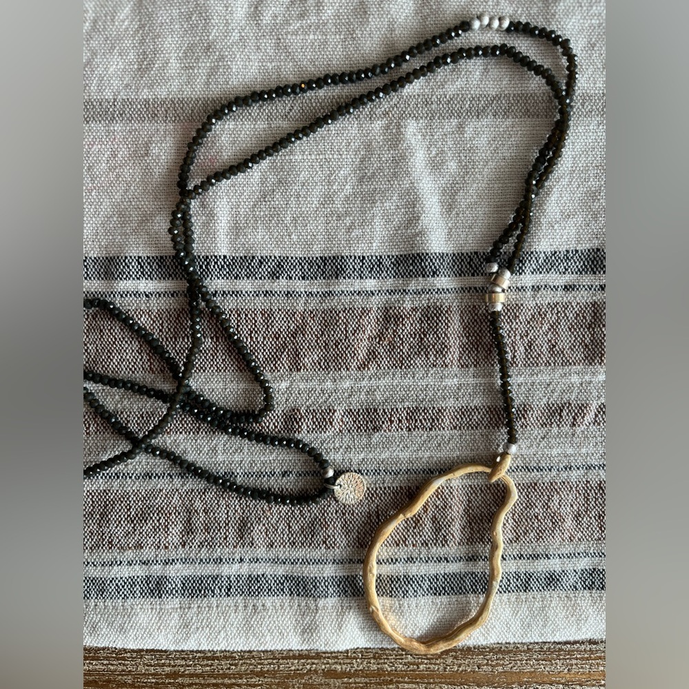 Beaded and‎ gold necklace
